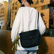 男士斜da包潮牌inda包女背包日系邮差帆布单肩包休闲学生包包