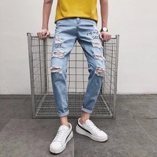 新品潮jb个性乞丐牛px生带图案修身(小)脚补丁有洞裤子非主流