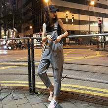 破洞牛pi背带裤女韩mo2020新式时尚洋气减龄显瘦九分连体裤子