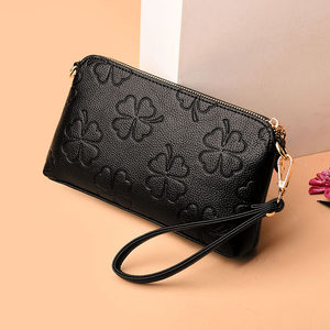 黑色手拎斜挎包图片