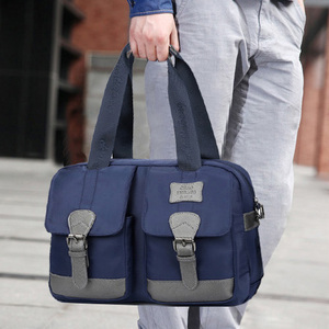 男士休闲运动手拎包图片