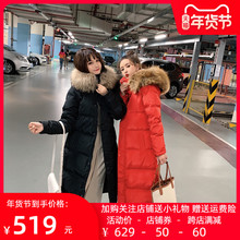 红色长we羽绒服女过uo20冬装新式韩款时尚宽松真毛领白鸭绒外套